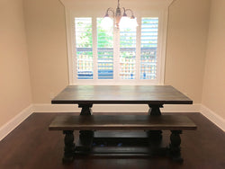 Milled trestle base dining table