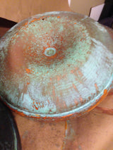 Repurposed chicken feeder light fixture
