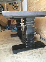 Milled trestle base dining table