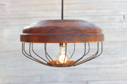 Repurposed chicken feeder light fixture
