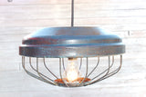 Repurposed chicken feeder light fixture